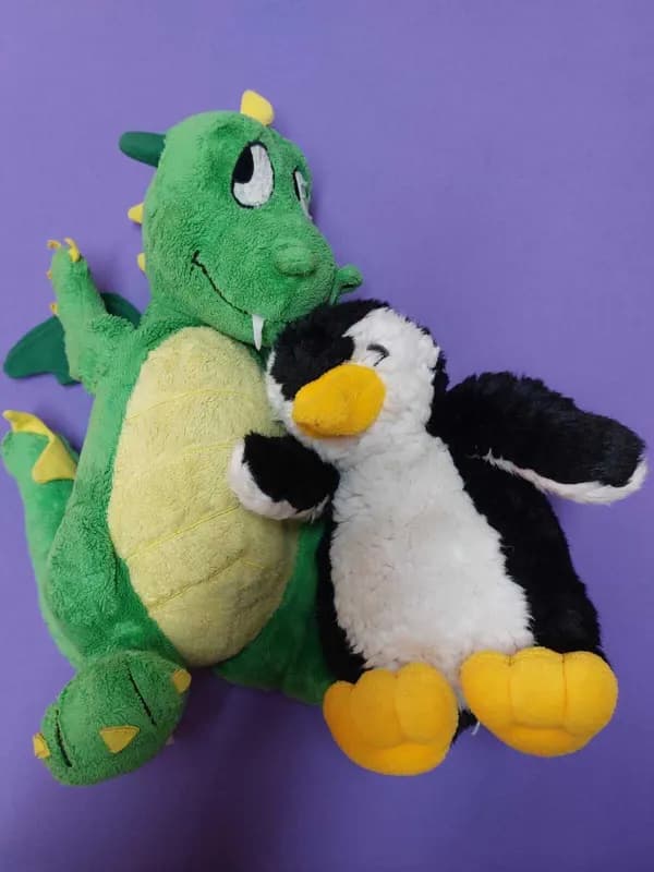 Maskottchen des Zugs Drachen & Pinguine